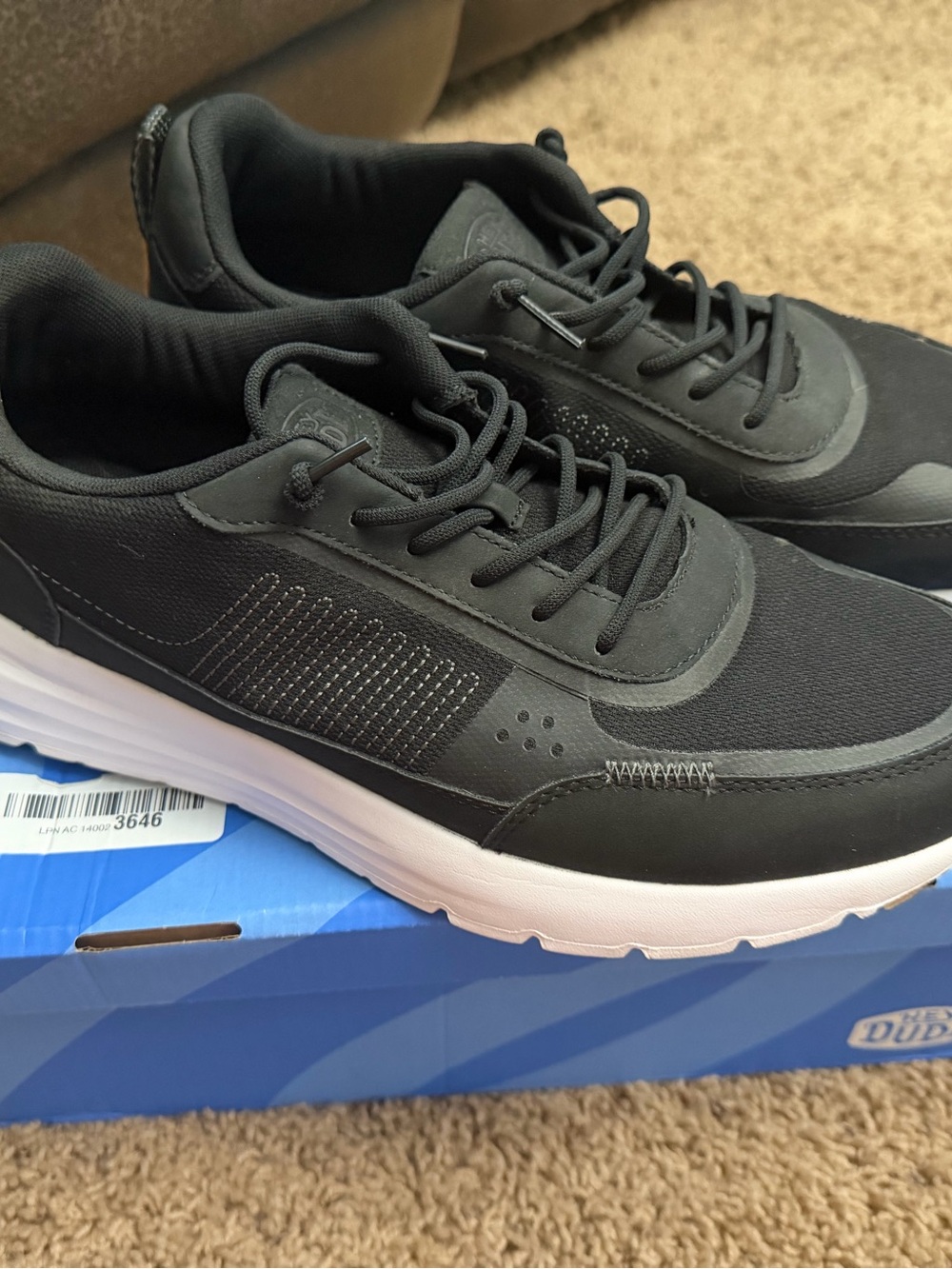 Hey Dude Men’s Black and White Casual Sneakers